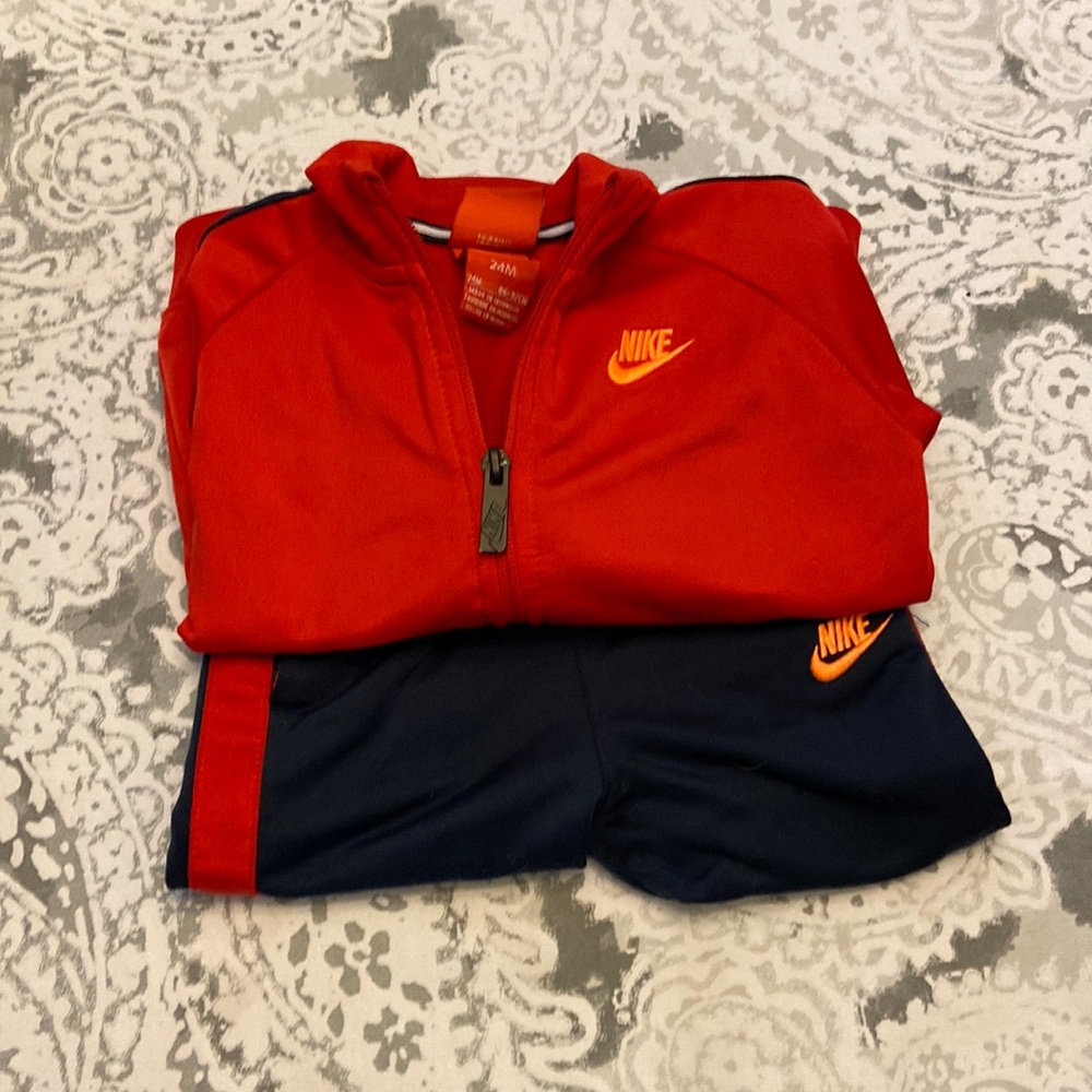 Nike two piece outfit with jacket and joggers size 24M